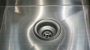 Close-up of stainless steel drain in kitchen sink